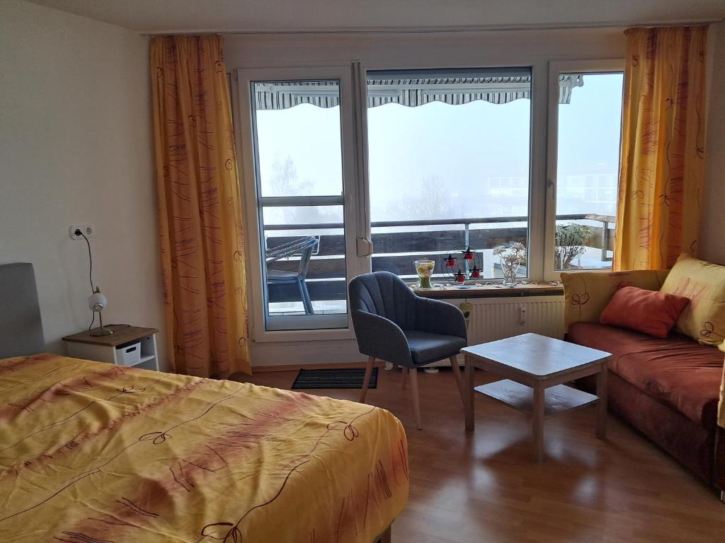 Postel nebo postele na pokoji v ubytování Rosenalm App 23