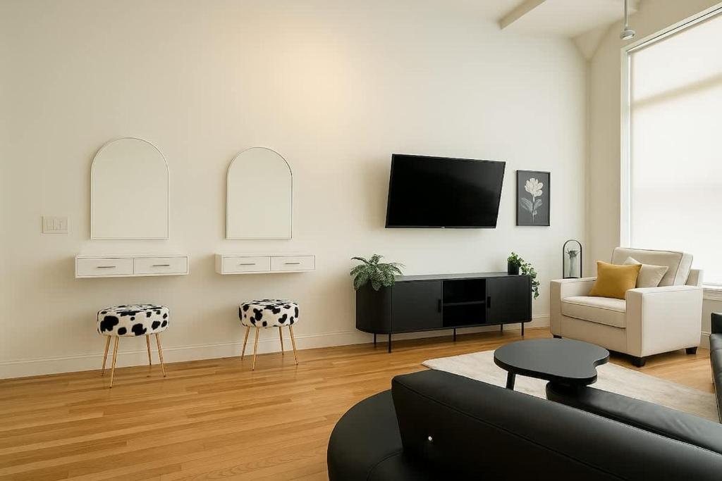 TV/trung tâm giải trí tại 101 Dalmatians Themed Double Queen Suite