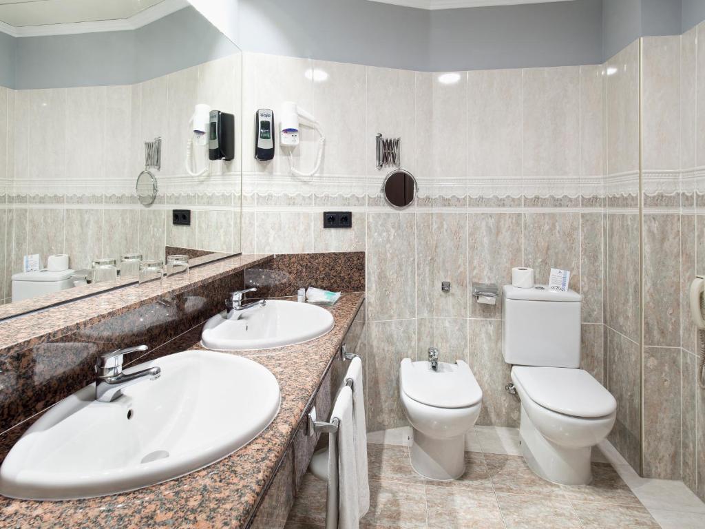 Koupelna v ubytování Hotel Zentral Parque