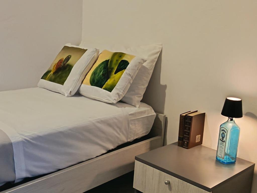 Giường trong phòng chung tại B&B A' Kiazza