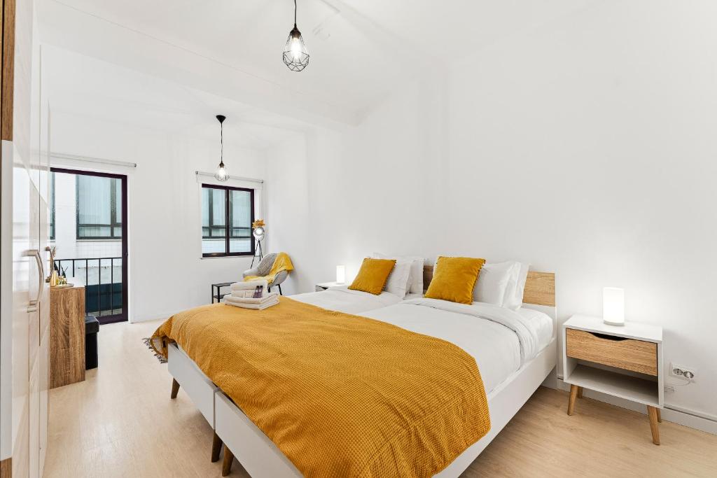 En eller flere senge i et værelse på Artistas House