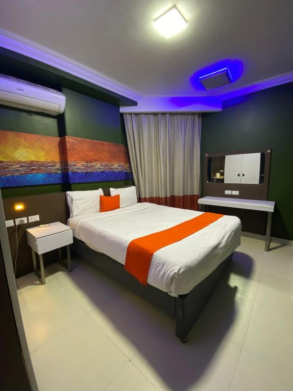 Postel nebo postele na pokoji v ubytování Nile Plaza Suites