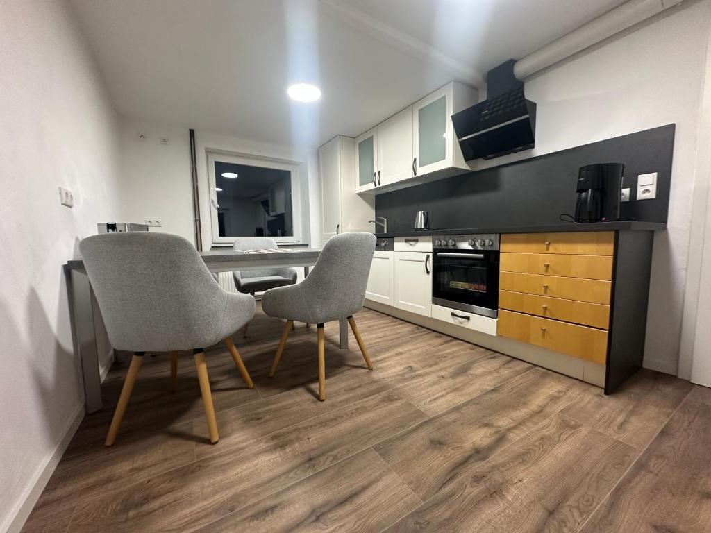 Кухня или мини-кухня в Gästehaus im Lindenweg
