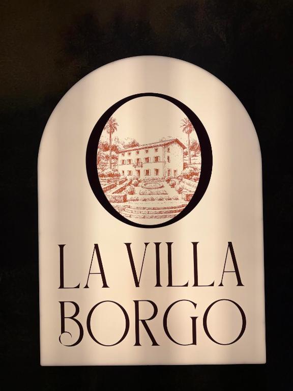 a sign for the la villa boroco at La Villa Borgo in Champagne-au-Mont-dʼOr