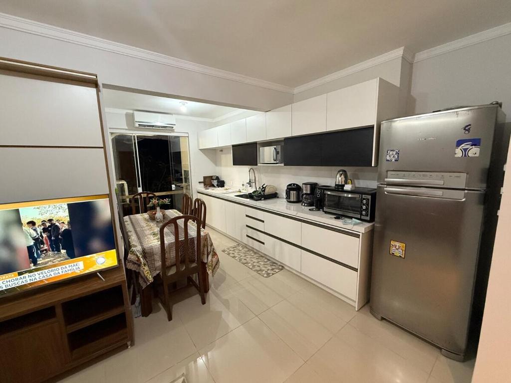 Køkken eller tekøkken på Apartamento Pantano do Sul