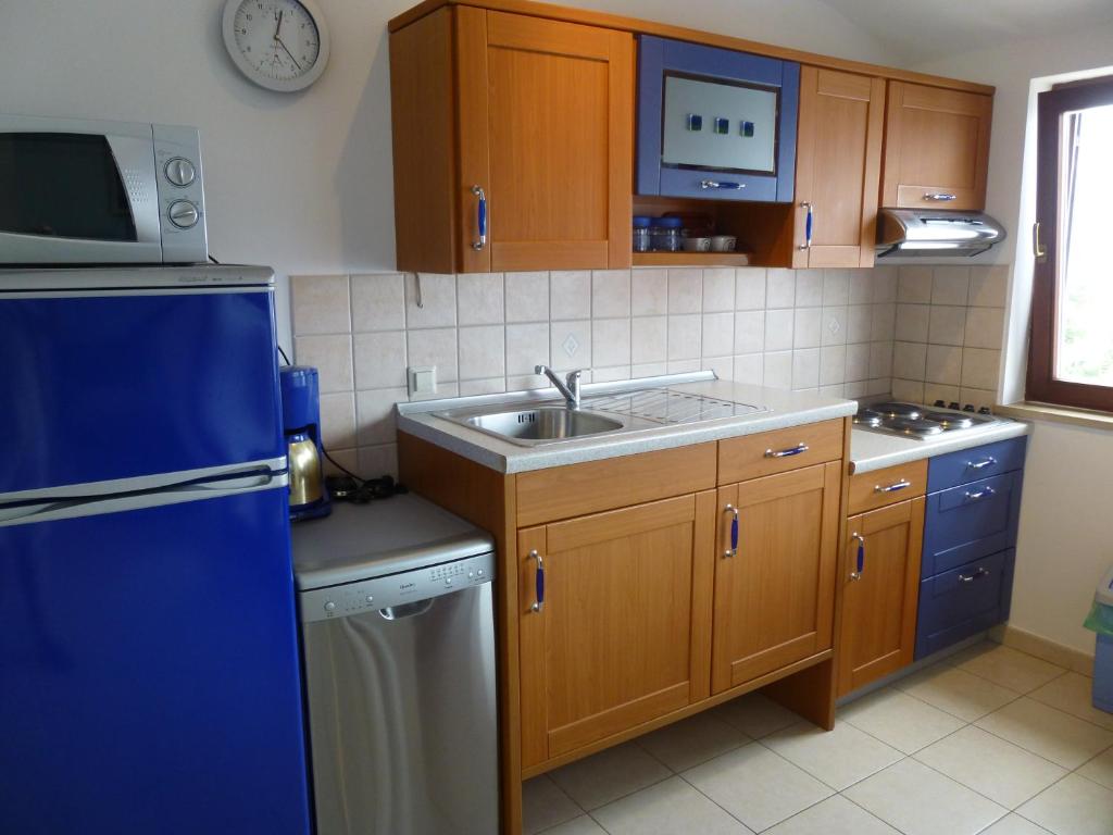 Kuchnia lub aneks kuchenny w obiekcie Apartment Grozic