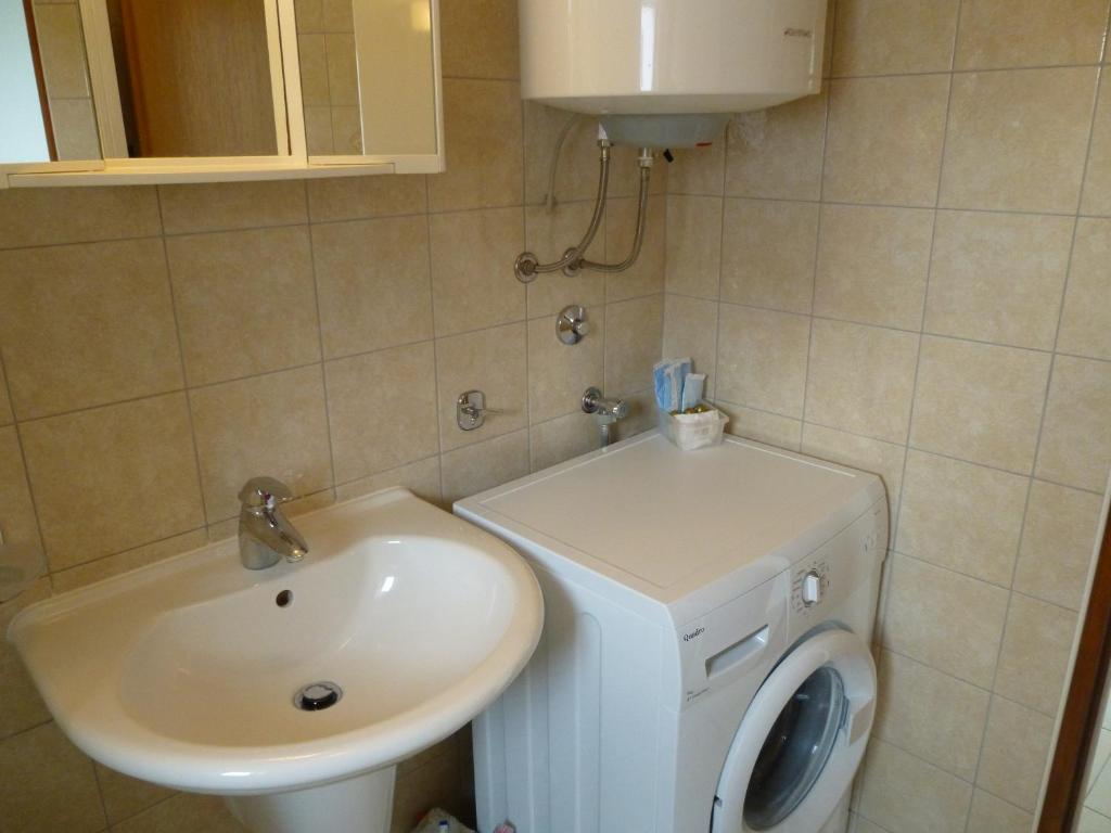 Łazienka w obiekcie Apartment Grozic