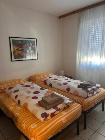 Postel nebo postele na pokoji v ubytování Casa Iris