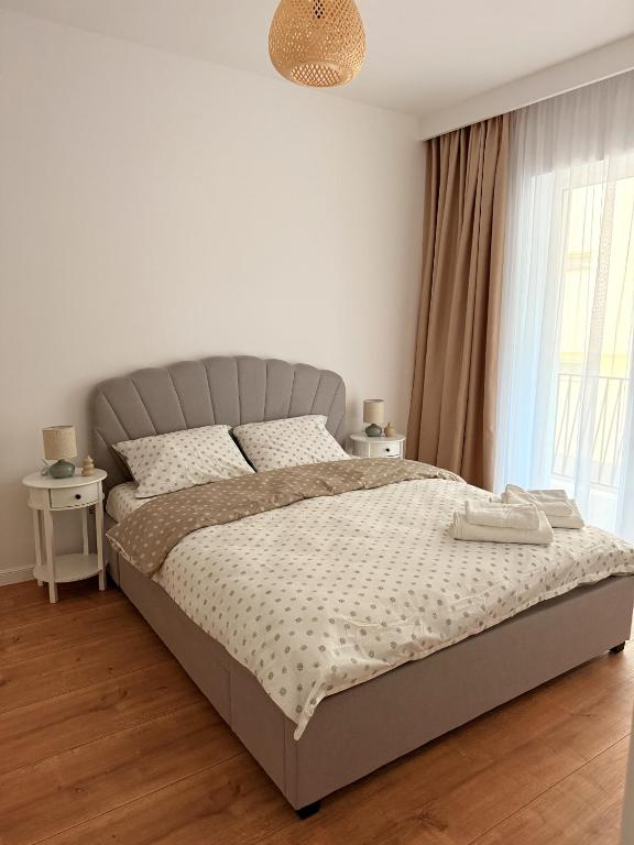 En eller flere senge i et værelse på Forestis Thermalis