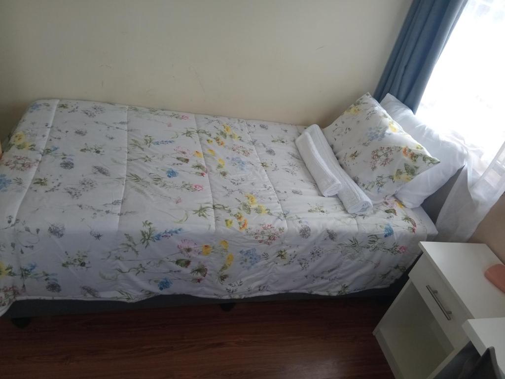 En eller flere senge i et værelse på C'ngela