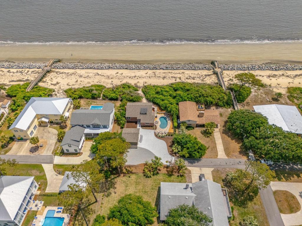 an aerial view of a beach with houses at 8 Stewart Lane in Jekyll Island