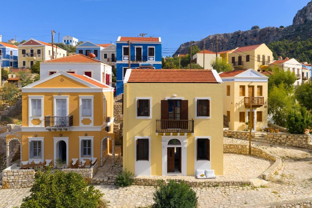 a group of houses in a village at Merry del Mare in Meyisti