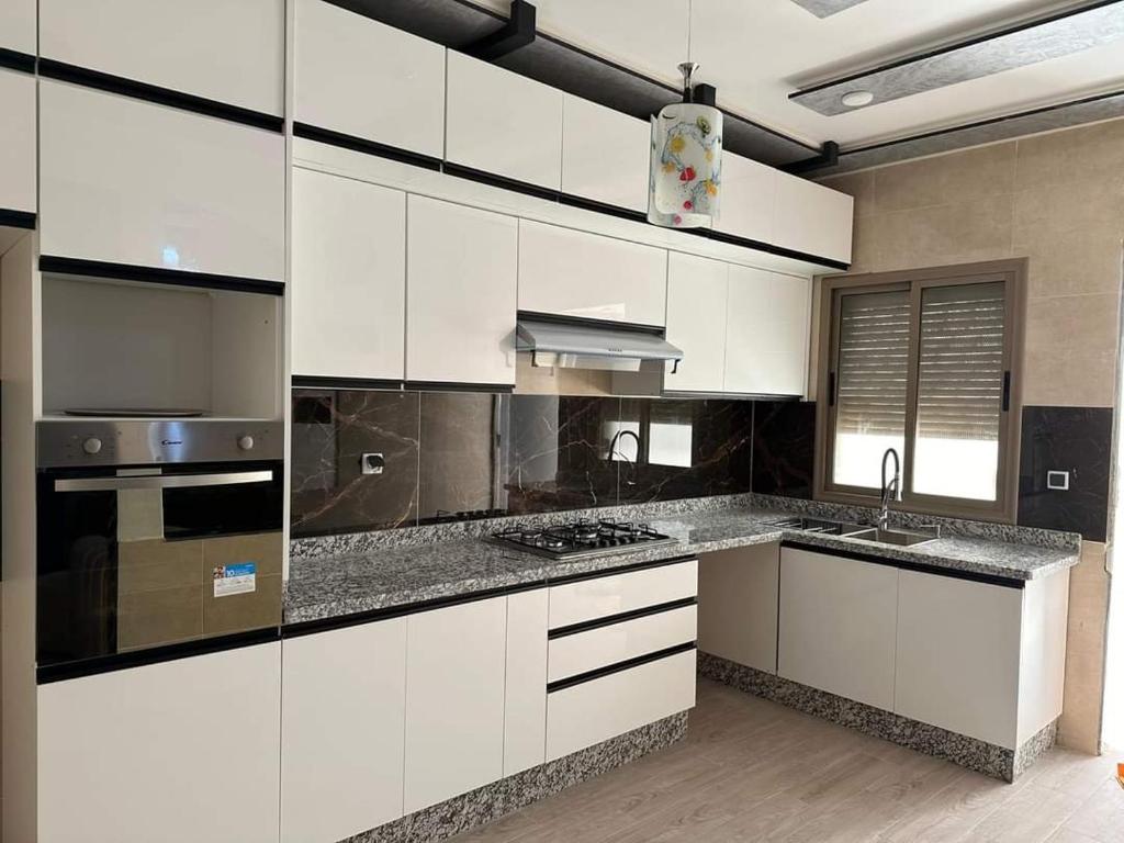 Una cocina o cocineta en Hote othmane