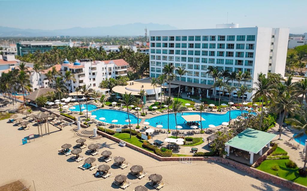 an aerial view of a resort with a pool at Ocean Breeze Nuevo Vallarta in Nuevo Vallarta