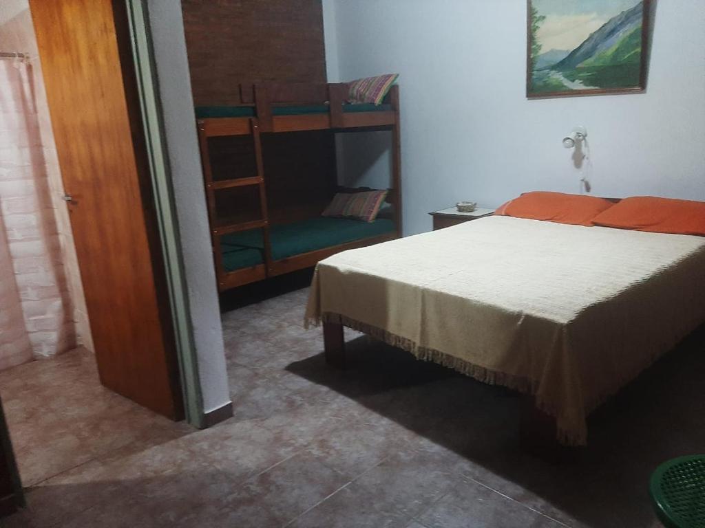 En eller flere senge i et værelse på Departamentos Mis 5 Soles