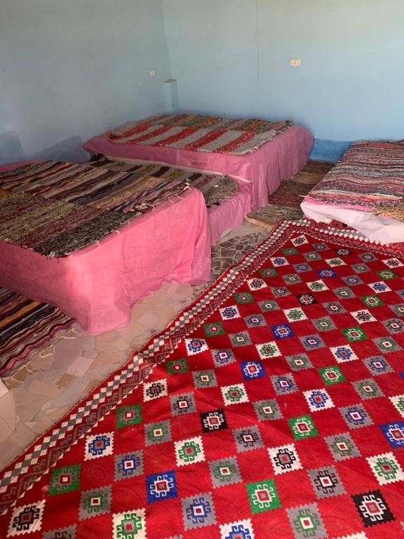 En eller flere senge i et værelse på Dendera Wellness Resort