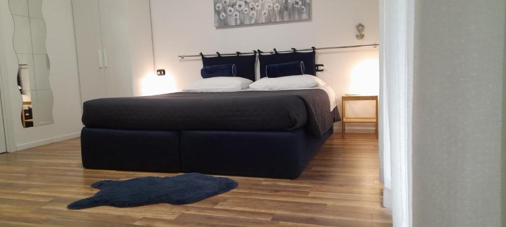 Postel nebo postele na pokoji v ubytování Cristel Malpensa apartment