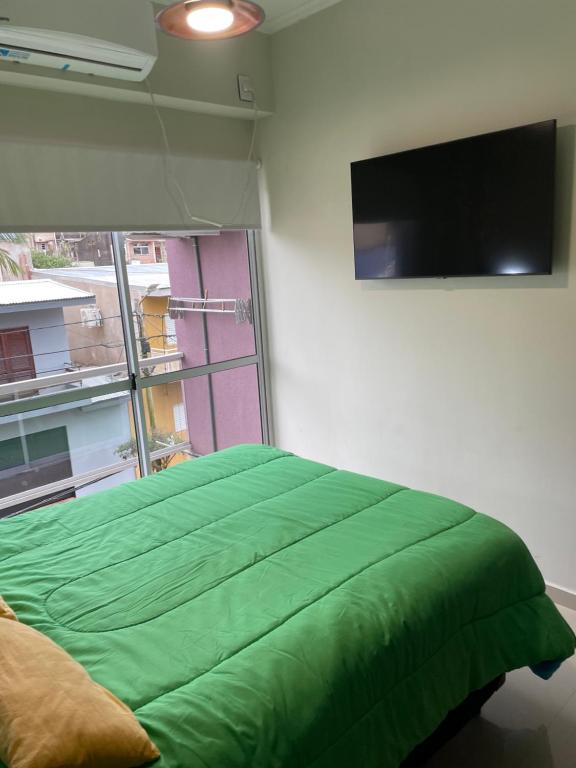 Et tv og/eller underholdning på Departamento Zona Costanera cuarto tramo