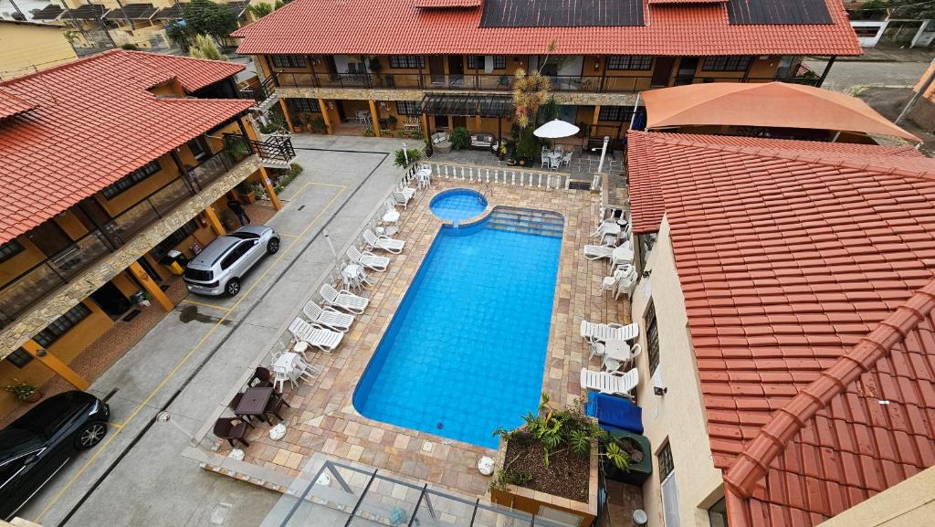 Bazén v ubytování Hotel Pousada Paradise nebo v jeho okolí