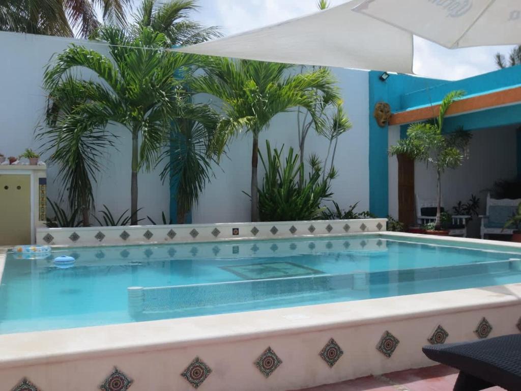 Bazén v ubytování Mini Vacation in Chelem nebo v jeho okolí