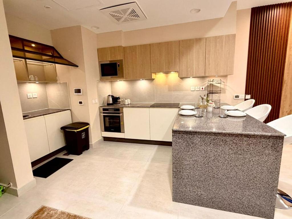 Kuchyň nebo kuchyňský kout v ubytování Goldcrest Lahore