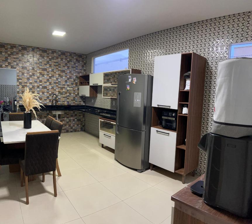 Køkken eller tekøkken på Refúgio dos Sonhos Conforto e Tranquilidade