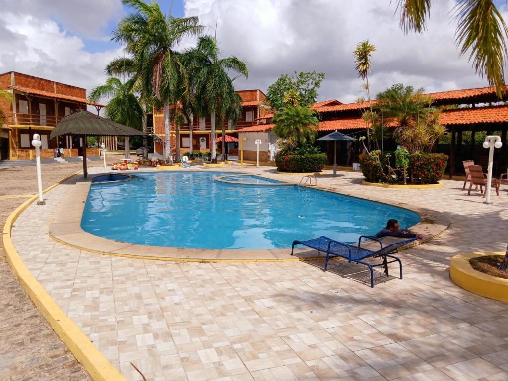 Swimmingpoolen hos eller tæt på Chalé Condomínio Porto dos Lençóis