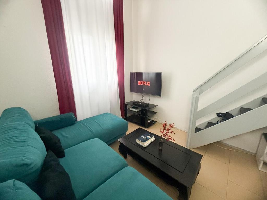 Et tv og/eller underholdning på Duplex Studio 4 pers - 15 min de Disney - RER A 5 min