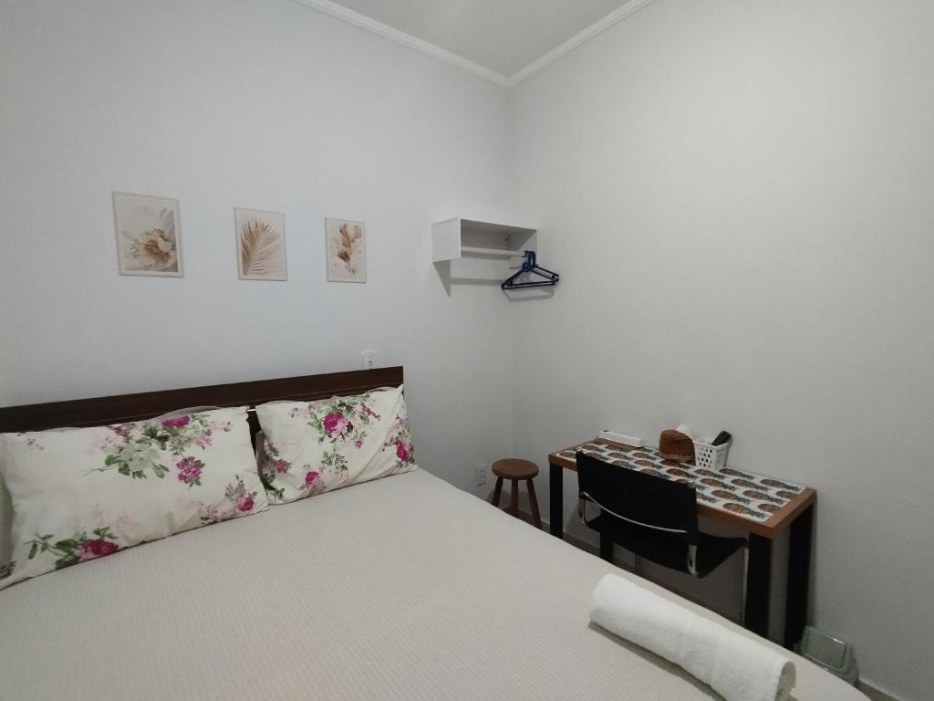 En eller flere senge i et værelse på Quarto Hokkaido na Sakura House