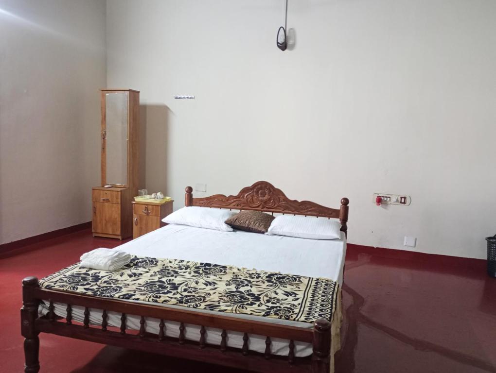 Giường trong phòng chung tại Anna's Heritage bungalow