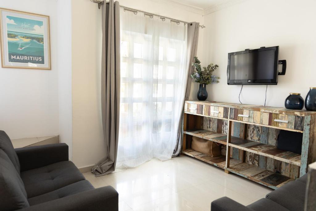 Et tv og/eller underholdning på Résidence du Moulin