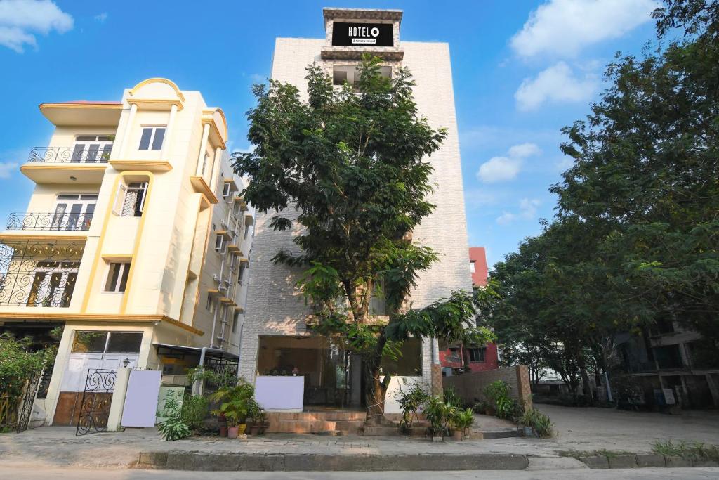 a building with a sign on the top of it at Super Collection O Biswa Bangla Convention Centre Kolkata Formerly Atithya Inn in New Town