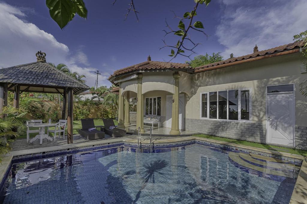 Бассейн в The Beverly Hills Bali Villas Jimbaran или поблизости
