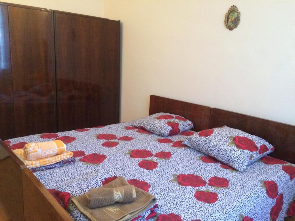 Postel nebo postele na pokoji v ubytování Alex's Cosy Guesthouse