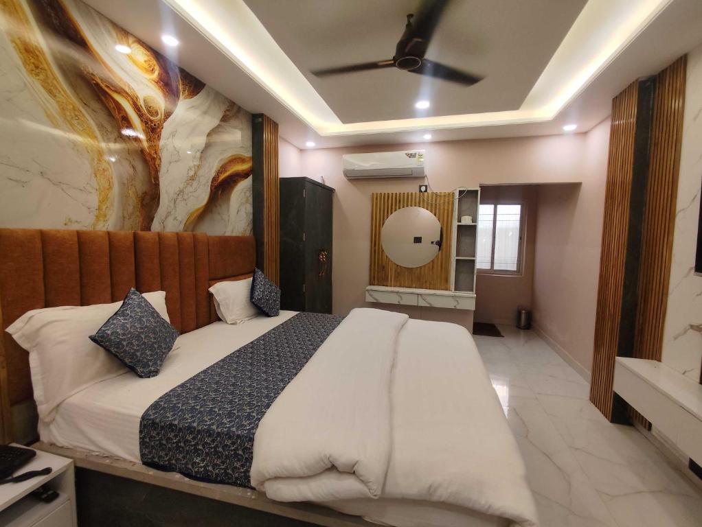 Ένα ή περισσότερα κρεβάτια σε δωμάτιο στο HOTEL O SKY LEAF