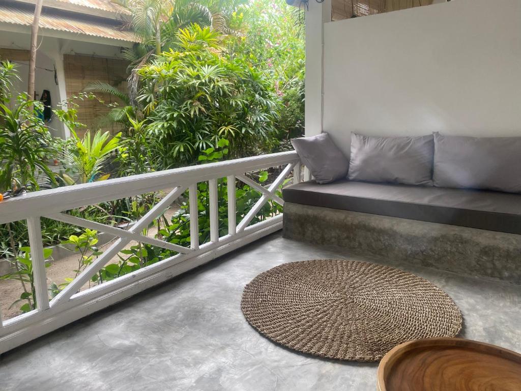 En balkon eller terrasse på Bella Gili Air