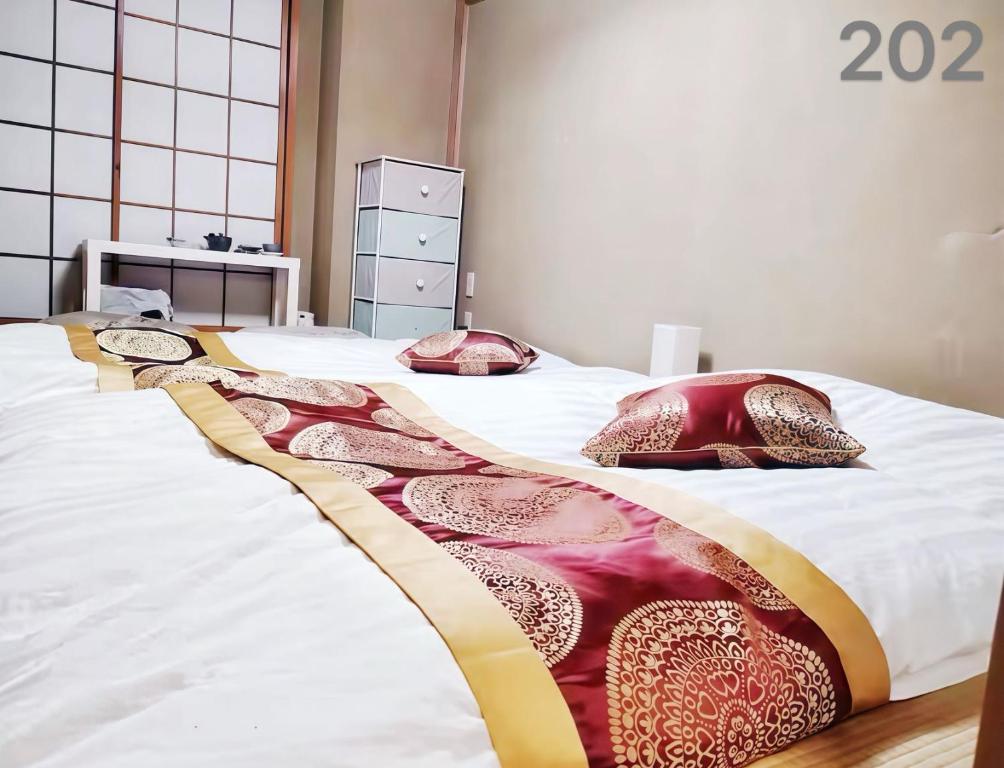 Ένα ή περισσότερα κρεβάτια σε δωμάτιο στο 烟雨轩 202