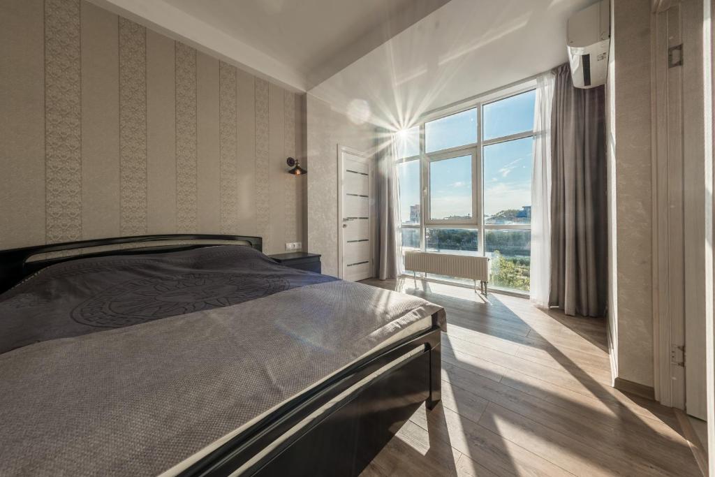 Кровать или кровати в номере Funduke Apartments