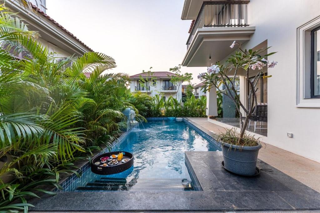 Πισίνα στο ή κοντά στο ELIVAAS Casa Bonita 4BHK Hideaway with Private Pool