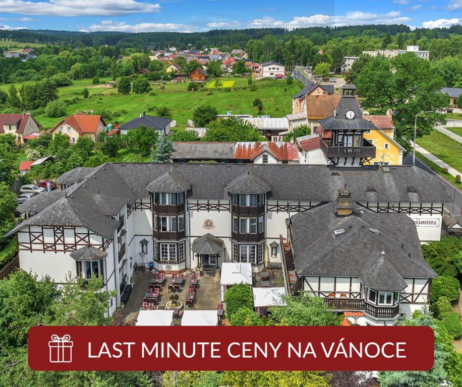 an aerial view of a large white mansion at Schlosshotel Marienbad in Mariánské Lázně