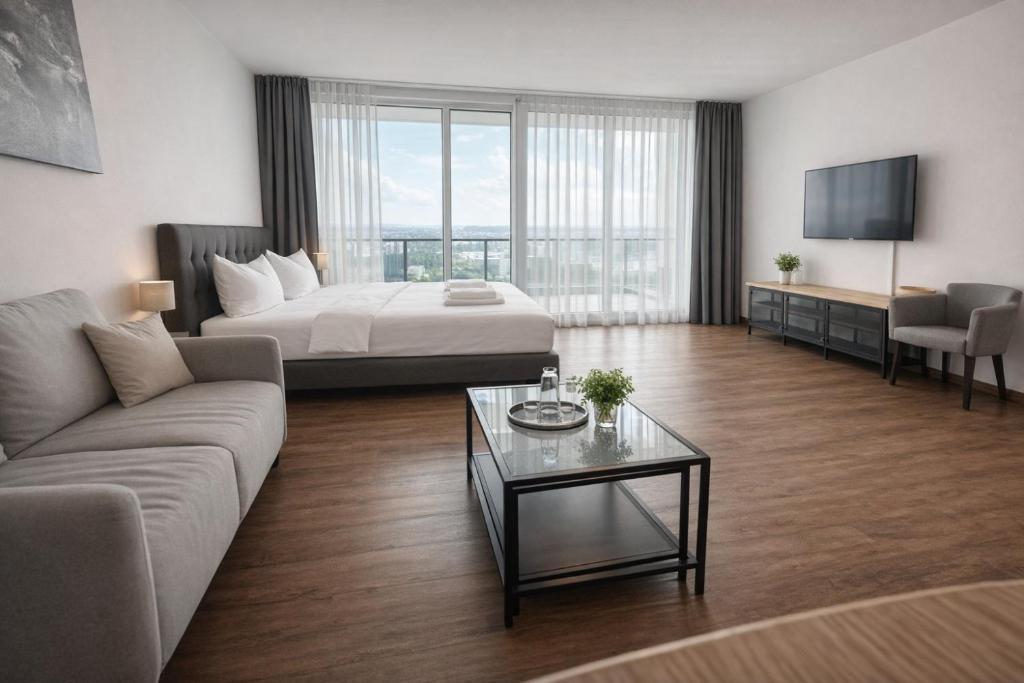 Postel nebo postele na pokoji v ubytování AR Boutique Hotel Kempten