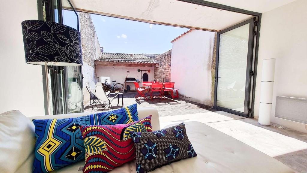 Et opholdsområde på Agréable villa au calme dans centre village