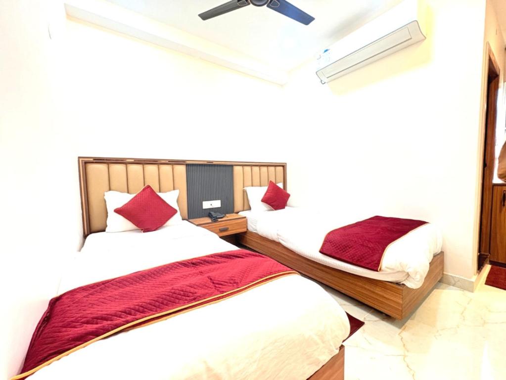 En eller flere senge i et værelse på The Gonesh Hotel