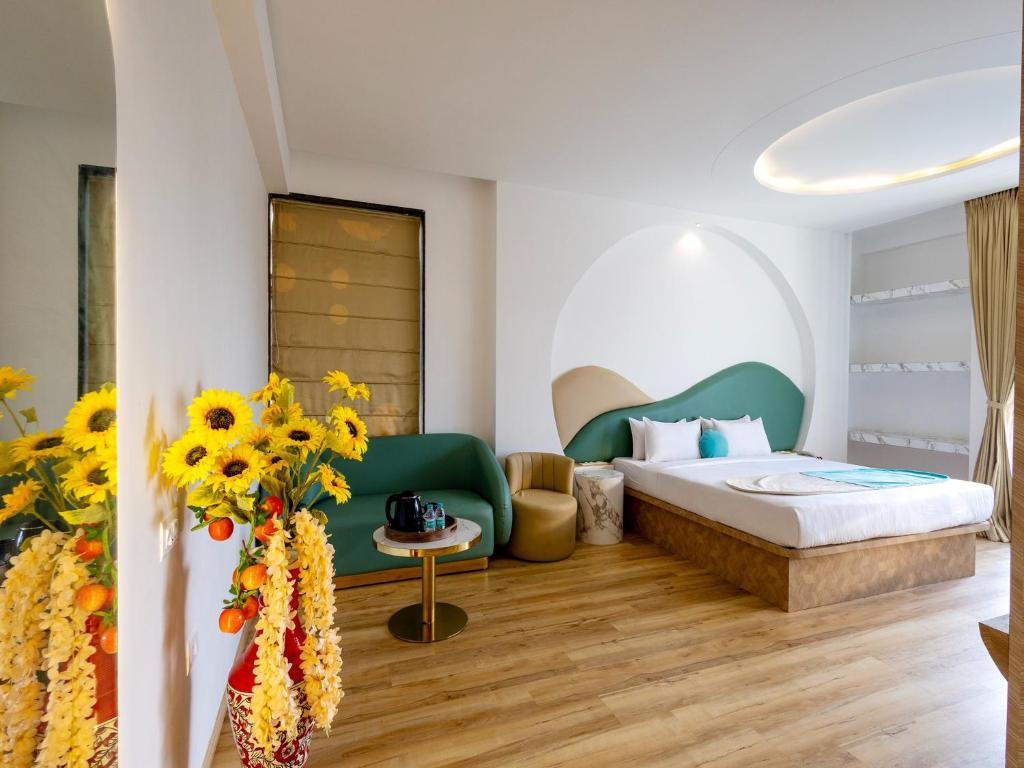 Postel nebo postele na pokoji v ubytování Palette The Moon Hotel by CheckIn Goa