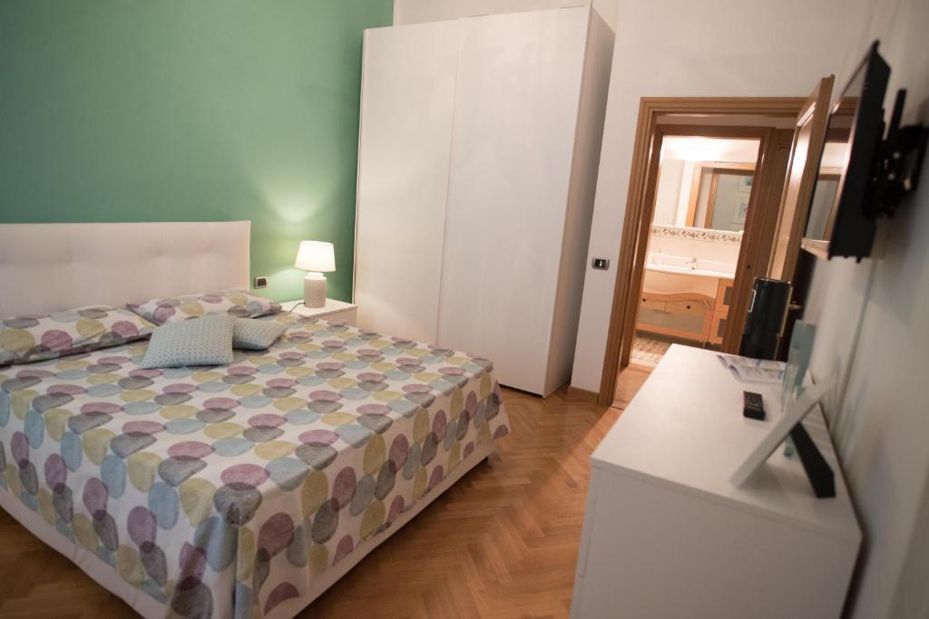A bed or beds in a room at Maison Étoile
