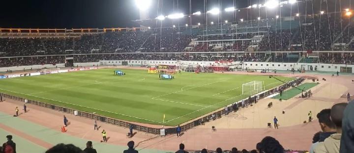 a soccer field with a crowd in a stadium at Budget Friendly Room - Near Adrar Stadium Limited units! secure yours today! in Inezgane