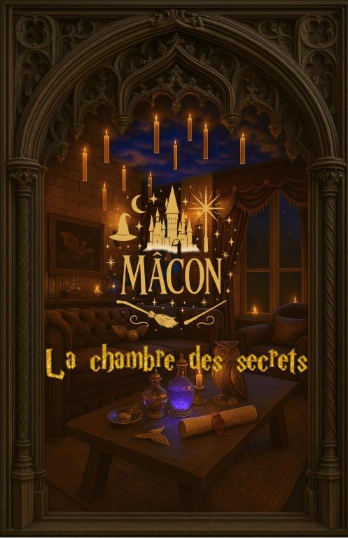a room with a table with candles and a sign that says macon at LA CHAMBRE DES SECRETS, Magique, Hyper-centre, 9 Couchages in Mâcon