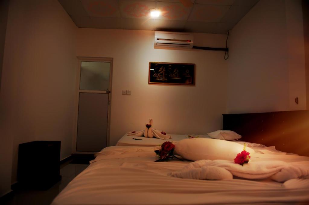 Postel nebo postele na pokoji v ubytování Hotel Glee