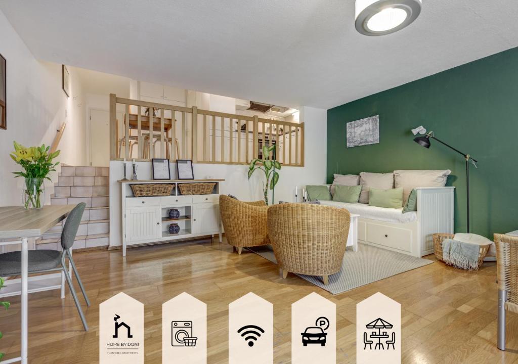 a living room with a couch and a table at Home by Doni I Zentral I Parkplatz I Balkon l 4 PAX in Wiesbaden