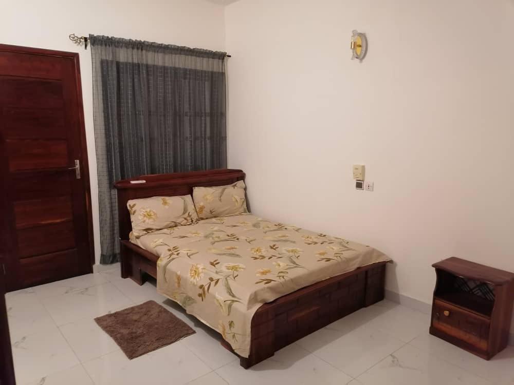 Giường trong phòng chung tại Maison de rêve